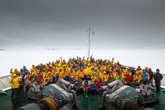 07C Tourists And Expedition Members Pose At The Front Of The Quark Expeditions Antarctica Cruise Ship At Deception Island.jpg